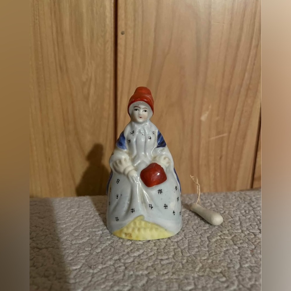Vintage Ceramic Figurine with Red and Blue Accents